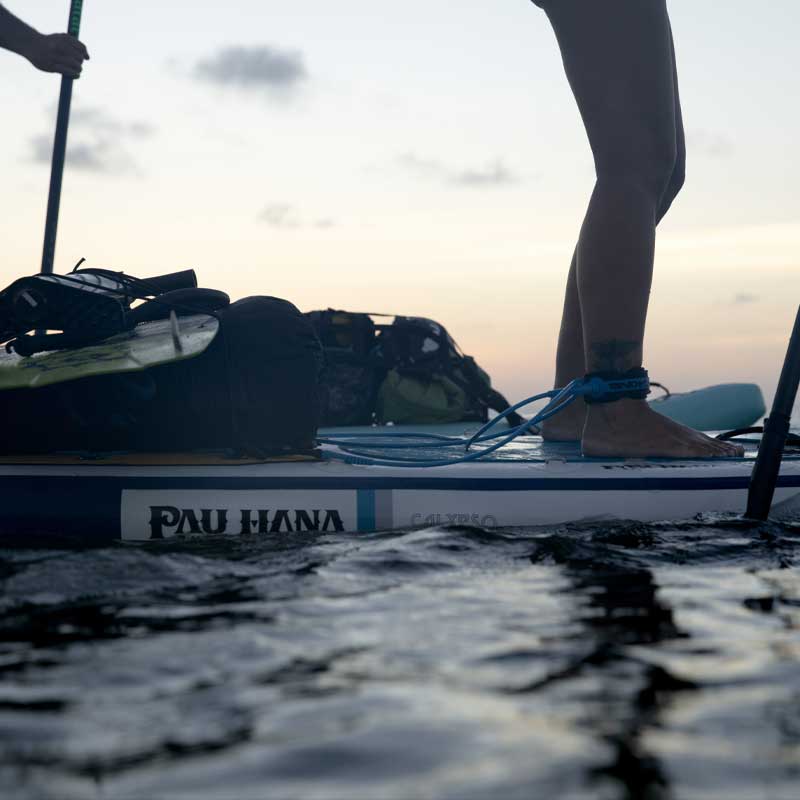 A close up image of the calypso inflatable paddleboard loaded with kiteboarding equipment