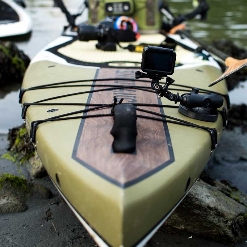 a close up of the nose of the endurance paddleboard rigged up with gear and equipment