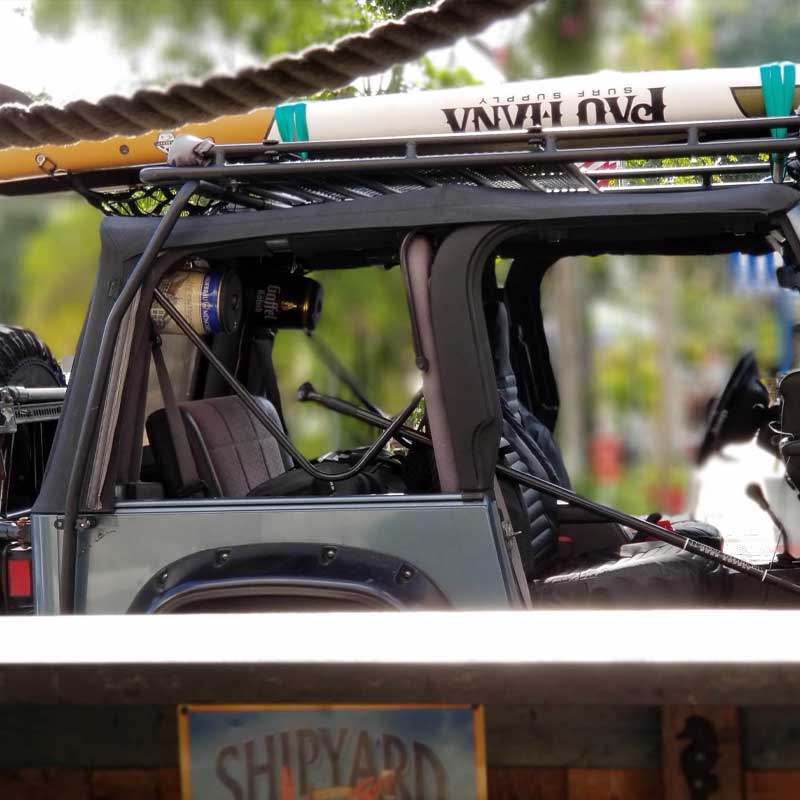 the endurance paddleboard on the roof of a jeep