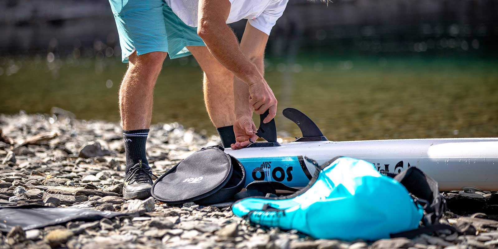 attaching fins to the solo ssup inflatable paddleboard